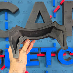 Detailed view of black rear spoiler mounted on OMP GP8 EVO helmet